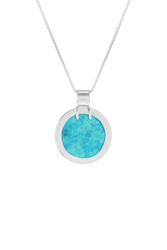 Architectural 925 sterling silver pool-shaped medium size pendant featuring a round blue turquoise gemstone with a chain.