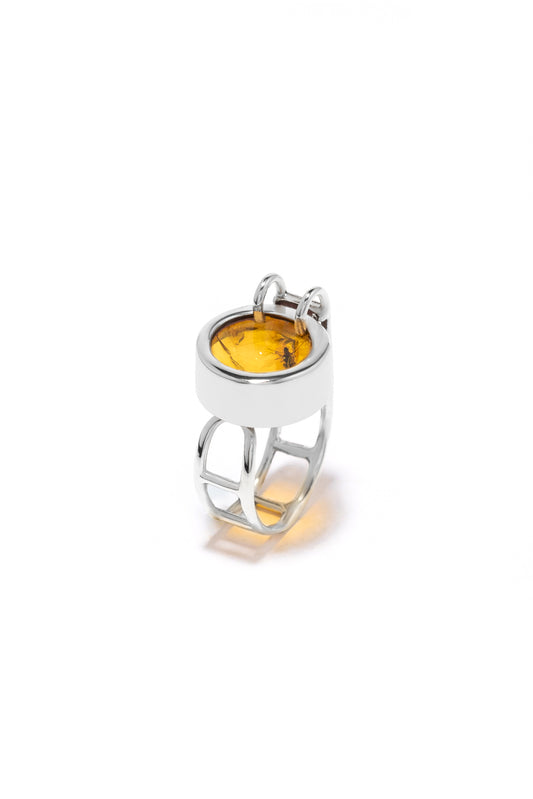 Architectural 925 sterling silver pool-shaped ring featuring a round Amber gemstone with an adjustable wide band.