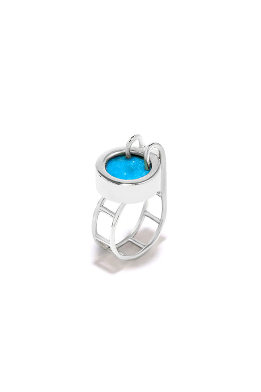 Architectural 925 sterling silver pool-shaped ring featuring a round blue Turquoise gemstone with an adjustable wide band.